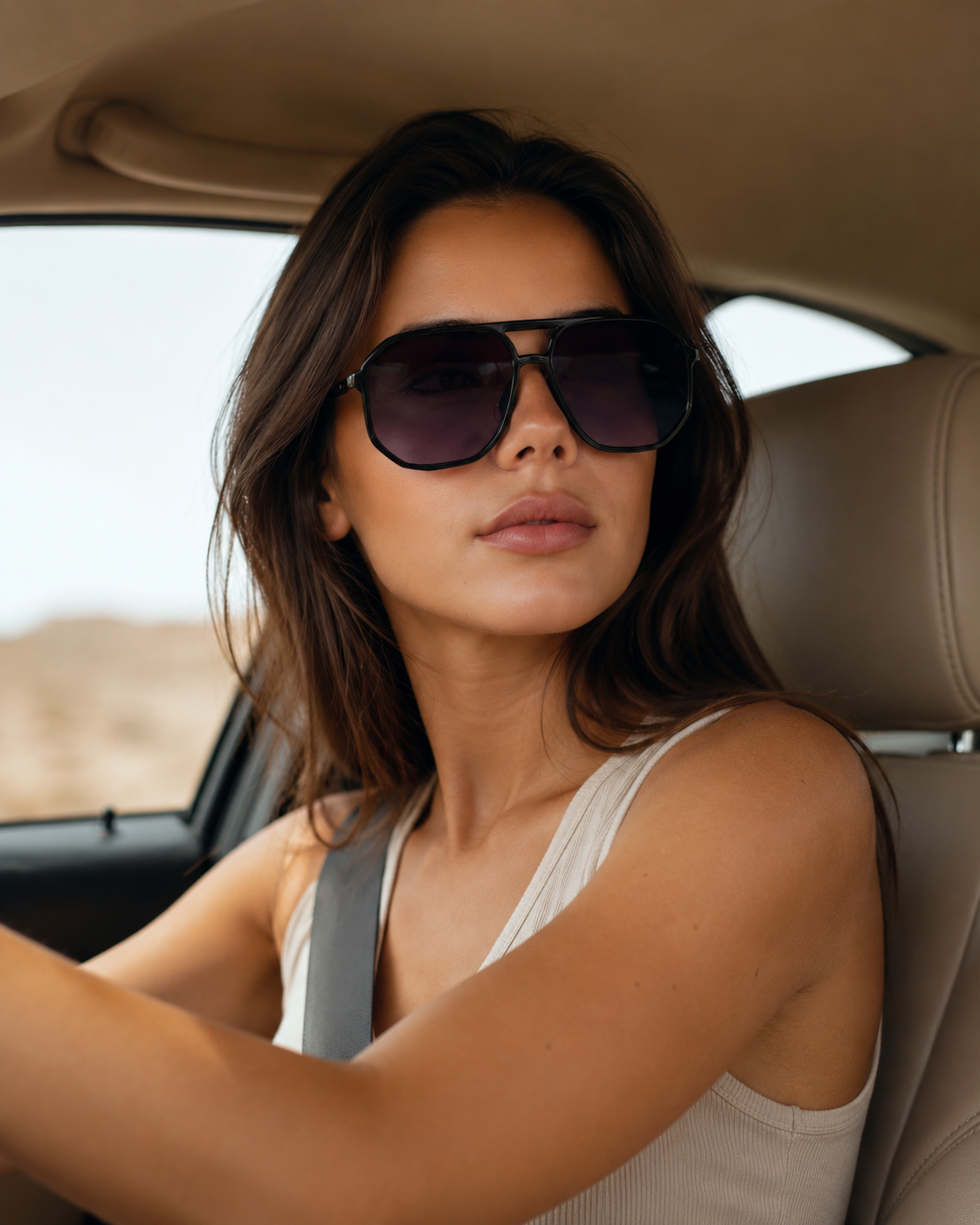 Stylish women’s sunglasses with purple gradient lenses and lightweight frame.